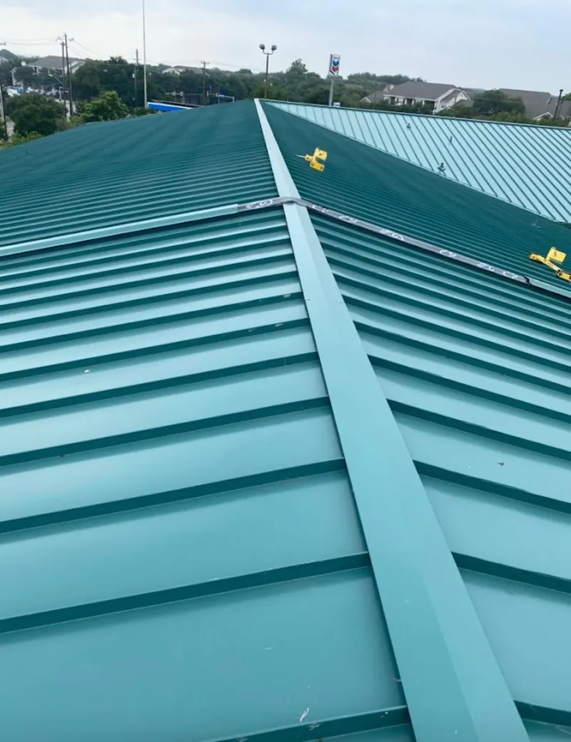 Green commercial metal roof ridge and valley for Metal Roof Repair in Mayfield