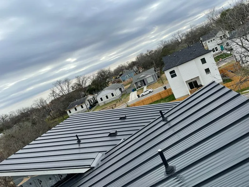 Standing seam metal roof panels with vents for Skylight Repair in Mayfield